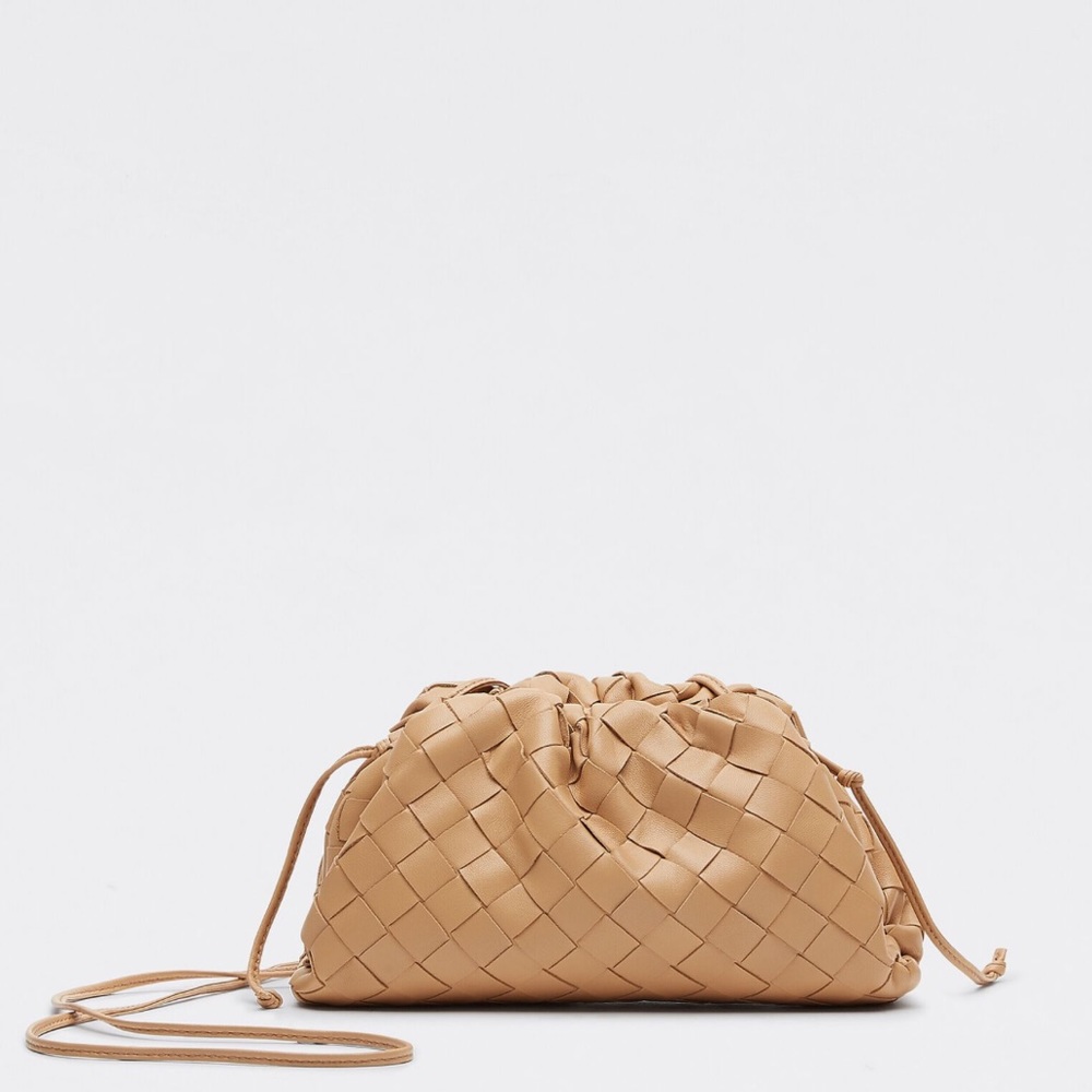 Bottega Veneta small pouch bag in almond.